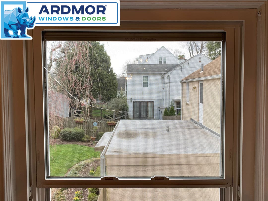 cracked_glass_replacement_in_vinyl_double_hung_window_in_wynnewood_pennsylvania_project_6646_before